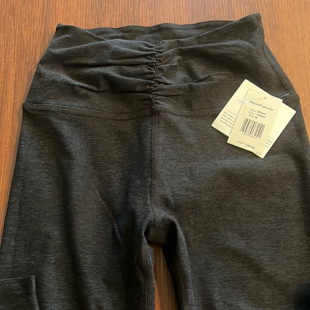 NWT LEGGINGS FROM BEYOND YOGA. Very dark heathered navy blue